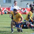 North Otago flanker Toni Taufa celebrates after scoring a try against Thames Valley at the Oamaru...