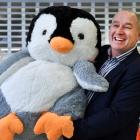 Toyworld Dunedin owner Mike Lee celebrates the retailer’s return to the city with a toy plush...