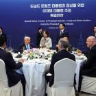 An intimate dinner party at the Apec conference in South Korea, featuring US President Donald...