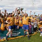 North Otago co-captains Cameron Rowland (left) and Hayden Tisdall lift the Lochore Cup after...