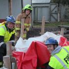 Edendale Volunteer Fire Brigade volunteers (from left) Taryn Latta, Lachie Shepard, 16 and Rhylee...