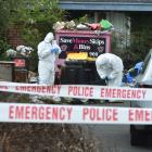 Police at the scene of the alleged murder. Photo: Gregor Richardson