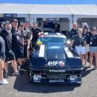 Dunedin driver Mike Wallace (fourth from the right) celebrates a good day at the Bathurst 1000...