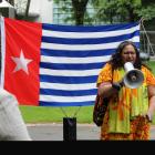 Indigenous rights activist Sina Brown-Davis speaks in front of the "Morning Star", the West...