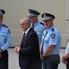 Australian Prime Minister Anthony Albanese visits the scene of the attack at Bondi Beach in...