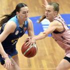 Southern Hoiho centre Jessie Edwards gets around Tokomanawa Queens point guard Kirsty Wallace...