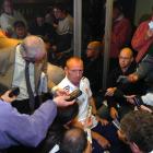 Long-serving British rugby writer Stephen Jones (back right, notebook held to face) looks pensive...