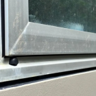 Fecal matter in sea spray on a home on Wellington's Esplanade. Photo: RNZ