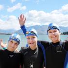 Friendly competitors (from left) Millie Campbell, Asha Blake and Esme McArthur, all 13 and of...