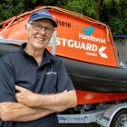 John Atkins next to Coastguard Sumner’s Hamilton Jet rescue boat. The jet can be used in breaking...