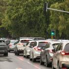 Cars using the green arrow to turn off Grahams Rd onto Memorial Ave. Photo: Geoff Sloan