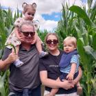 Garth Cleland, of Riversdale, transports his granddaughter Pippa Stewart, 2, while his daughter...