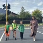 West Rolleston School pupils (from left) Scarlett, Maddison, and William, with principal Sylvia...