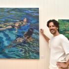 Marko Hruybj-Piper at Gallery De Novo with two of his works. P HOTOS: GREGOR RICHARDSON