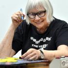 Ruth Groffman lines up her next word at the National Scrabble Day celebrations at the South...
