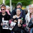Families of people working at the pulp and paper mill attended a vigil. Photo: Reuters 