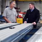General manager Allan Golden (left) and contracts manager Marty Reddy at Action Engineering where...