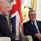 New Zealand Prime Minister Christopher Luxon (L) talks with UK Prime Minster Keir Starmer in...