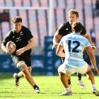 Finn McLeod takes the ball into contact for New Zealand against Argentina in the under 20 Rugby...