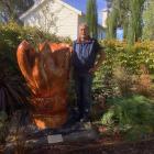Artist Tavita Faafoi is pictured with his sculpture ‘Kāwhai — New Beginnings'. PHOTO: SUPPLIED