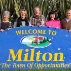 Hoping for the successful sale of the sign are Bruce Community Facilities Trust fundraising ...