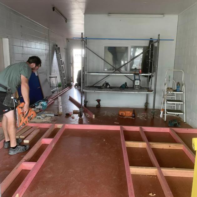 Builder Cory Sutherland helping with the fit-out. Photo: Supplied