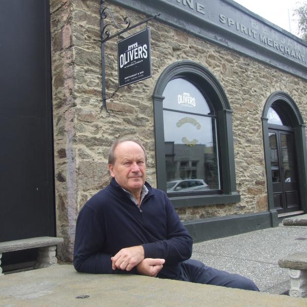 Central Otago Heritage Trust chairman David Ritchie takes a seat in front of Olivers Restaurant...