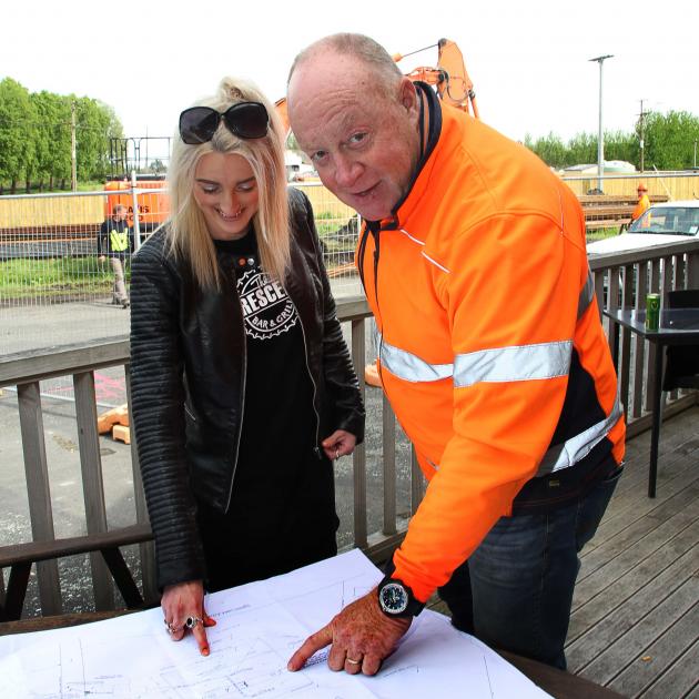 Looking over the plans for the new petrol station in Kaitangata are  Crescent Bar and Grill co...