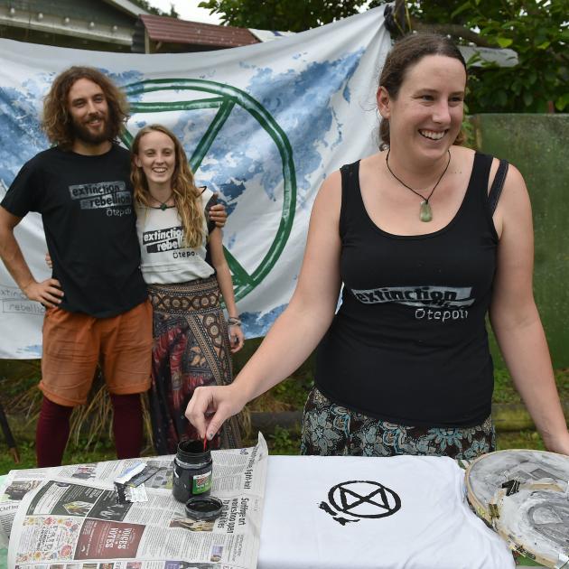 Extinction Rebellion Otepoti members (from left) Jamie Prout (25), Danika Hotham (22) and Rachael...