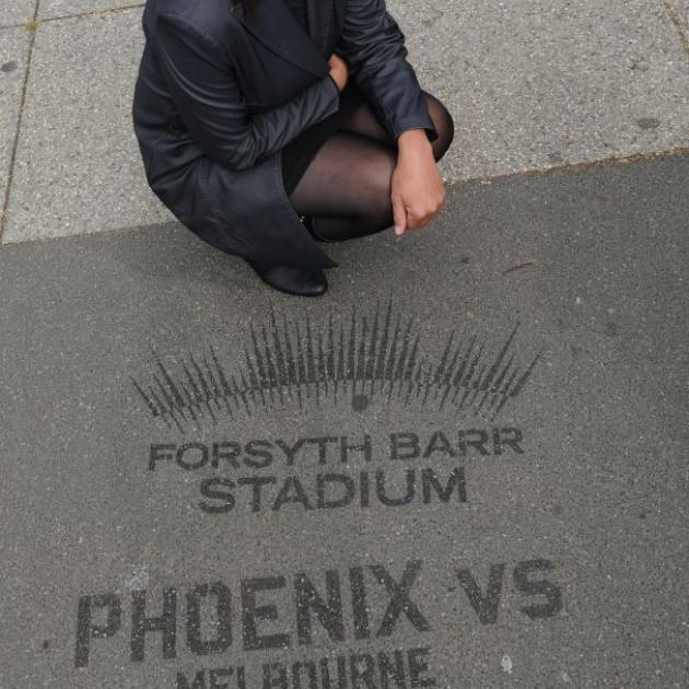 Clean Advertising NZ media director Jo-Anne Cook is upset the council has told her to remove  water-blasted signs from around Dunedin. Photo by Craig Baxter. 