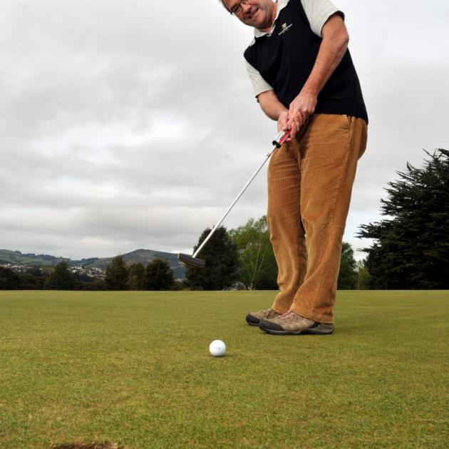 Otago Golf Club general manager John Molyneux practises his putting at Balmacewen. Photo by Gregor Richardson.