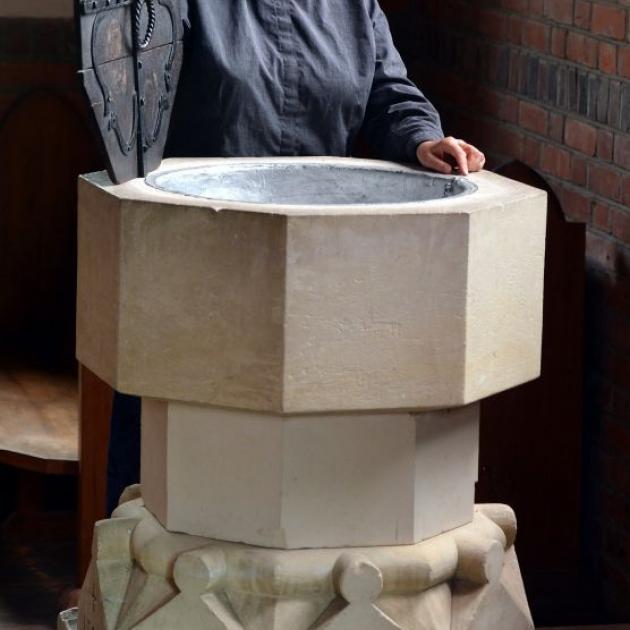 Milton-Tuapeka vicar the Rev Vivienne Galletly with the font in the soon-to-be decommissioned Church of the Holy Trinity in Lawrence. Photo by Stephen Jaquiery. 