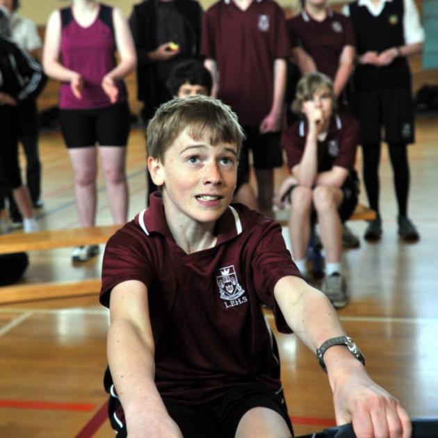 Logan Park High School pupil Theo Molteno (14) puts his back into the school's annual rowing regatta yesterday.  Photo by Gregor Richardson.