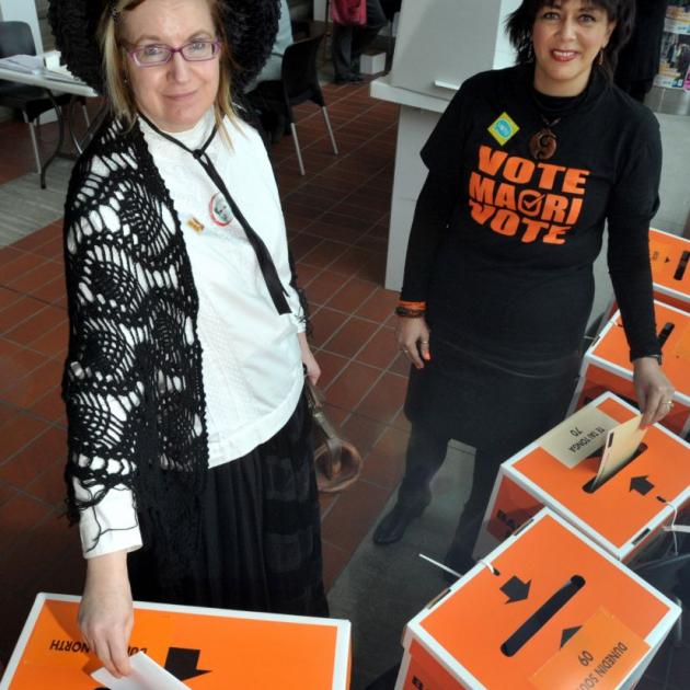 Public Service Association co-conveners Lucy Gray (left) and Gail Arthur voting yesterday at the University of Otago polling booth. Photo by Gregor Richardson.  