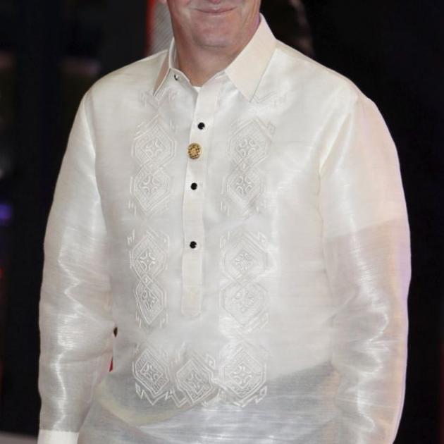 John Key wearing a traditional Philippine "barong" shirt for a welcome dinner in Manilla. Photo: Reuters 
