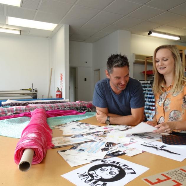 Director Doug Kamo and costume designer Jennifer Hughson look over some of the fresh new designs for the show's costumes at The Fabric Shop in Dunedin. Workshops and auditions for the show are coming up later this month. PHOTO: BRENDA HARWOOD