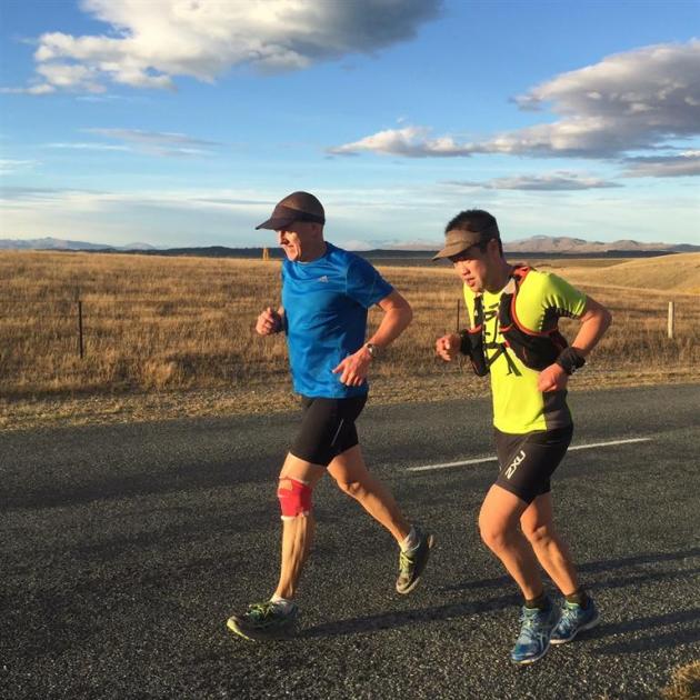 Glenn Sutton (left) gets support from Greg Yee on his Alps 2 Ocean cycle trail run on Saturday. Photo: supplied Glenn Sutton (left) gets support from Greg Yee on his Alps 2 Ocean cycle trail run on Saturday. Photo: supplied