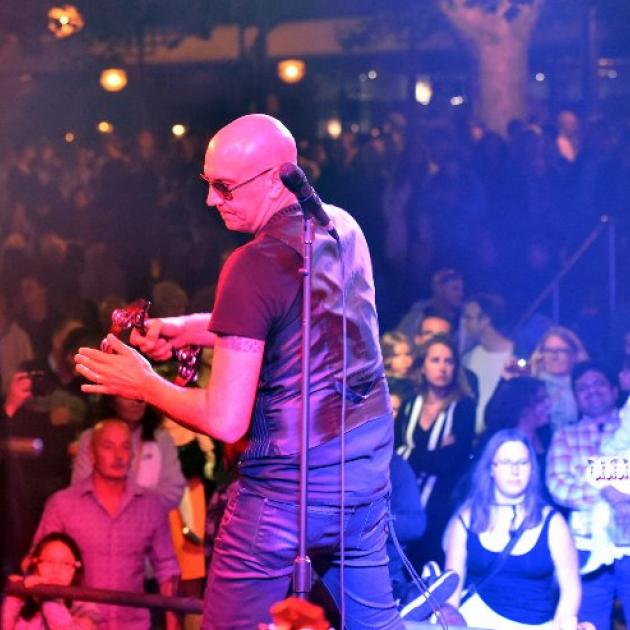 Jason Bird from Christchurch band The Easy Hearts  entertains the crowd in the Octagon. Photo by Gregor Richardson