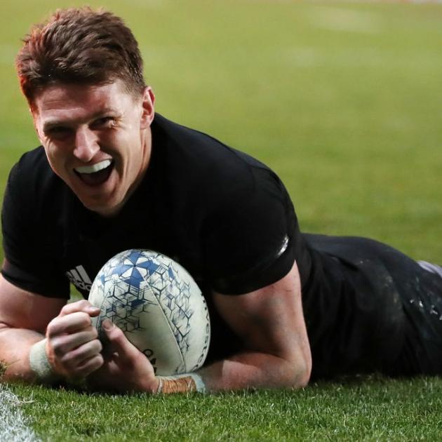 Beauden Barrett celebrates one of four tries at Eden Park on Saturday. The star first five-eighth...