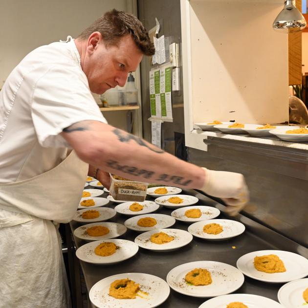 Chef Greg Piner prepares entrees.