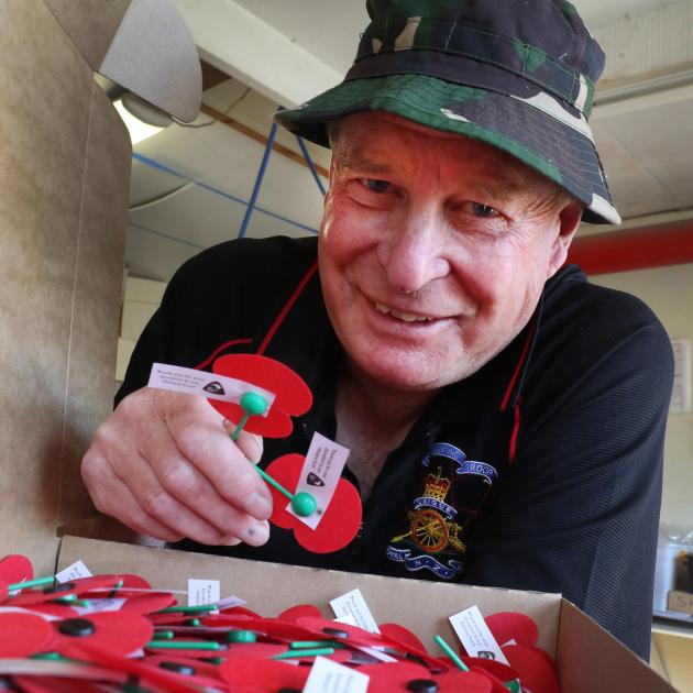 Skin Frances checks out the latest batch of poppies. Photo: John Cosgrove