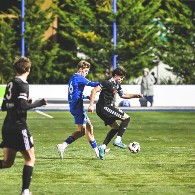 Coastal Spirit and Christchurch United captains Joe Hoole and Jago Godden vie for the ball during...