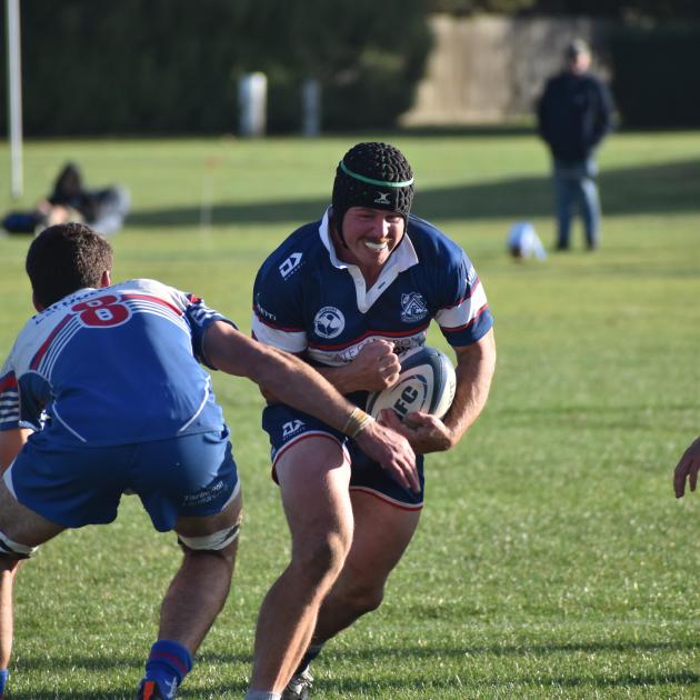 Openside flanker Tom Ballantyne hits the line for Prebbleton against Southern in an attempt to...