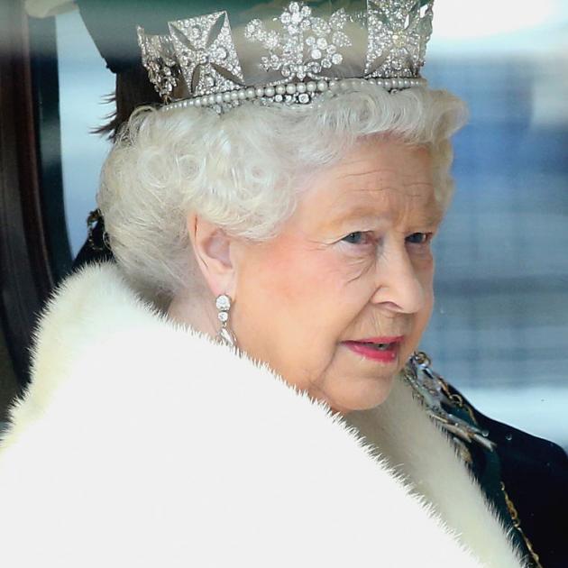The Queen dressed in white fur for the Sate Opening of Parliament. Photo: Getty Images