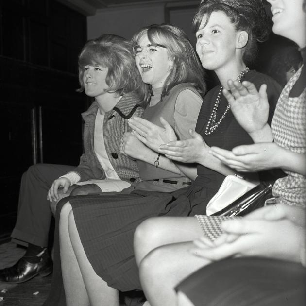 Unidentified young women react to The Beatles on stage in Dunedin.