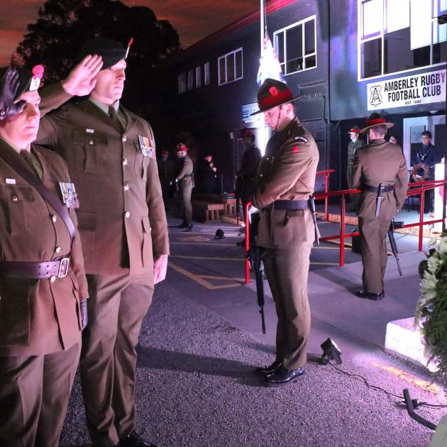 Army Captain Arno Bekker and Lance Corporal Dylan Fisher laid a wreath at the dawn service on...