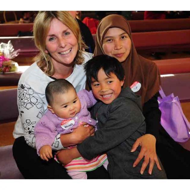 Denise Bryant, Aminah Ahmad (9 mths) , Ayoub Ahmad (5) and Rini Ahmad.