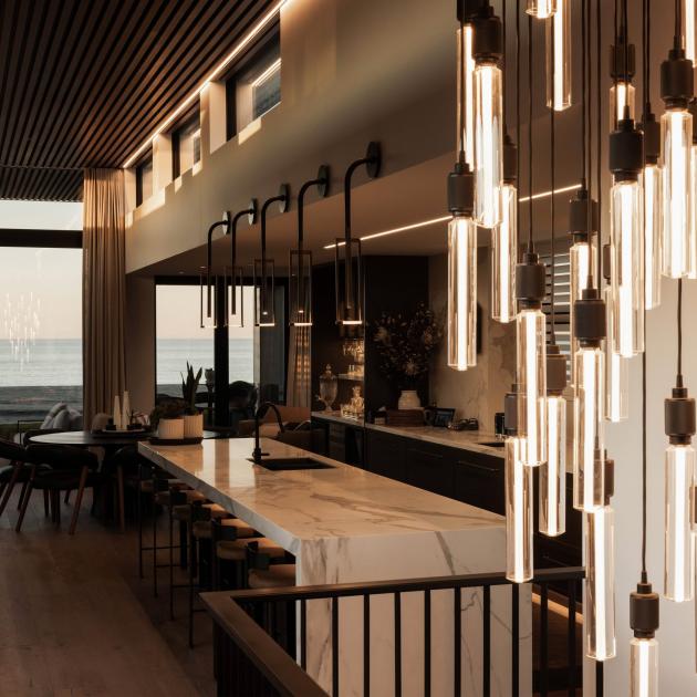Perched on the edge of the shoreline, this beach front residence is an interior design venture...