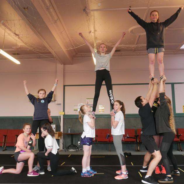 Eclipse Cheerleading athletes form pyramids at practice last month. PHOTO: JESSICA WILSON