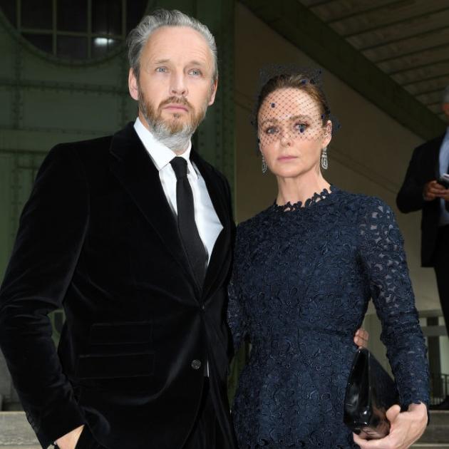 Stella McCartney and Alasdhair Willis pose prior to the Karl Lagerfeld Homage at Grand Palais on...